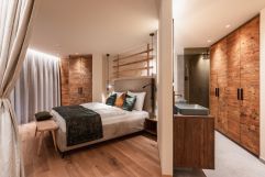 Moderner Schlaf- und Badbereich (c) Daniel Demichiel (Fontis luxury spa lodge)