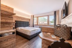 Rustikales Schlafzimmer (Ravelli Hotels)